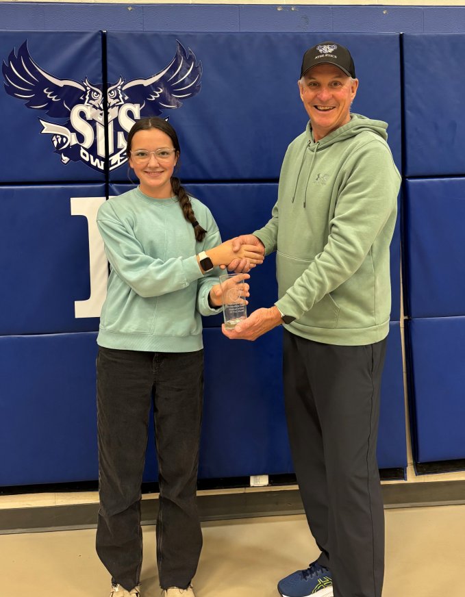 Bridget Cheverie Field Hockey SIS presented with PEISAA Award Glass from AD Rob Connell. 
